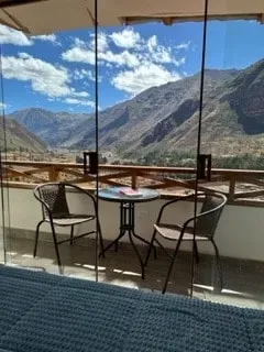 Muses Inspired — Perched in Qosqo Ayllu, Peru, Muses Inspired boasts majestic views of the Sacred Valley and the Urubamba River. The property is built into the side of Pacha Tuscon Mountain, surrounded by fields of corn and alfalfa, creating a tranquil and natural environment. Wild Harris Hawks and a gentle dog named Chaska add to the unique, harmonious atmosphere.