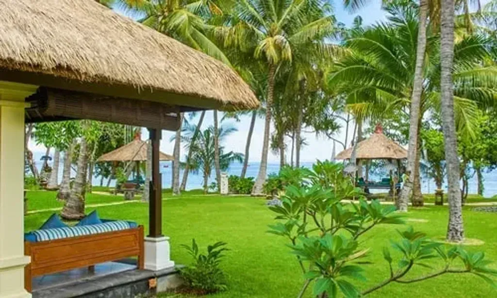 Nourish Move Love Bali — This retreat unfolds on the peaceful northern shores of Bali, offering a serene beachfront escape. The resort itself is a harmonious blend of traditional Balinese architecture and modern amenities, surrounded by lush tropical gardens that ensure privacy and a sense of calm. It's a place where the natural beauty of Bali provides a perfect backdrop for introspection and rejuvenation.