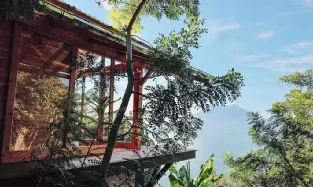 Omera — Omera is set in the vibrant landscape of Jaibalito, overlooking the crystal-clear blue waters of Lake Atitlan. The center boasts a peaceful sacred ceremony space amidst Jacote fruit trees and abundant flora and fauna, with stoic volcanoes providing a dramatic backdrop.
