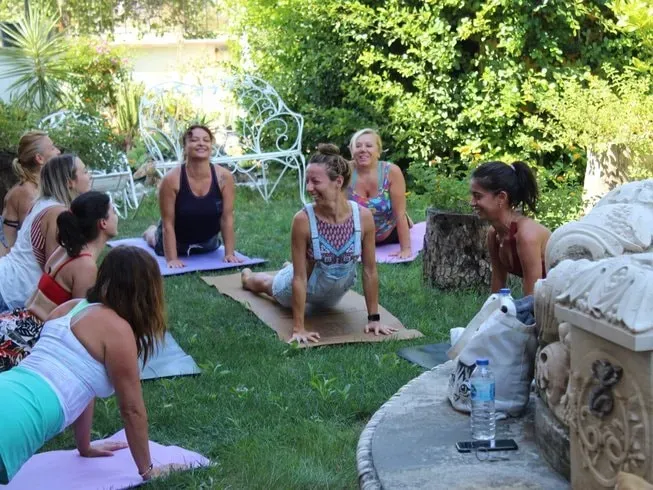 OmSiva Yoga Health & Life Academy — The center is housed in a charming villa set on a gentle hill, offering picturesque sea views. Surrounded by a private garden and featuring its own pool, the atmosphere is one of peaceful tranquility, yet it remains conveniently located within the city. It's a place where nature and comfort intertwine, providing a serene escape.