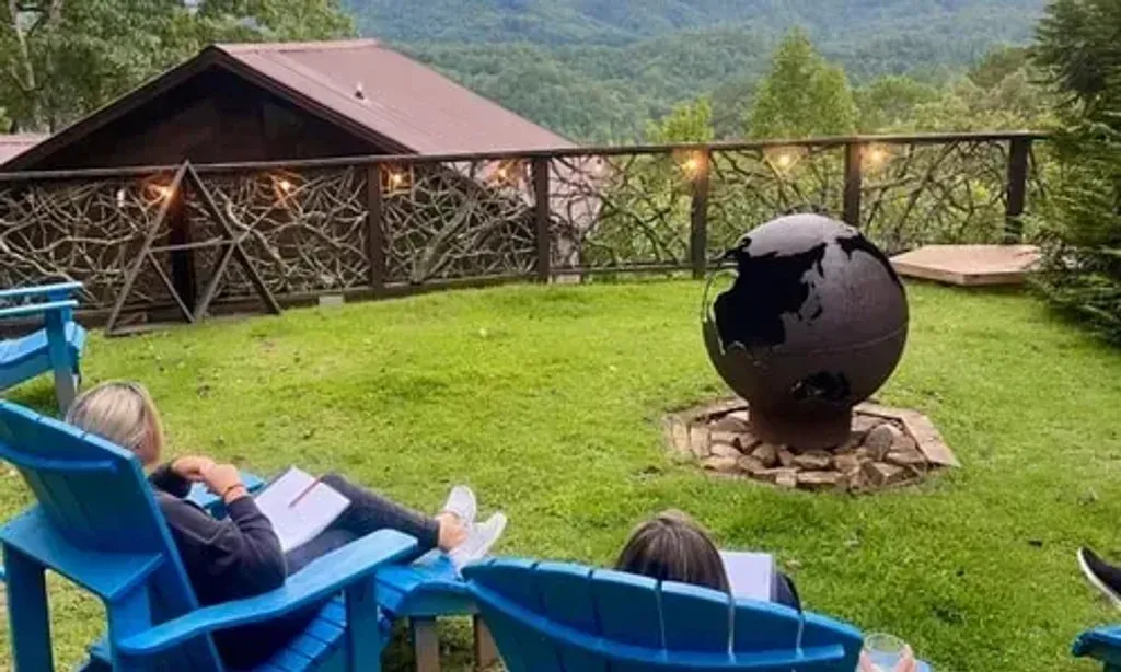 Orchid & Palm Wellness — located in the tranquil woods of Bryson City, North Carolina, the center offers a peaceful escape. The natural surroundings provide a serene backdrop for reflection and rejuvenation, allowing guests to truly disconnect from urban noise and immerse themselves in the calming embrace of nature.