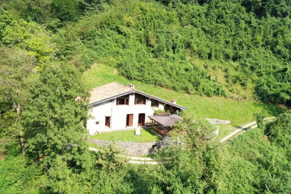 Paola Ghidini — set in the picturesque Italian countryside of Forno D'Ono, this retreat offers a tranquil escape. The surrounding landscape provides a peaceful backdrop for introspection and connection with nature, inviting guests to embrace a slower pace of life.