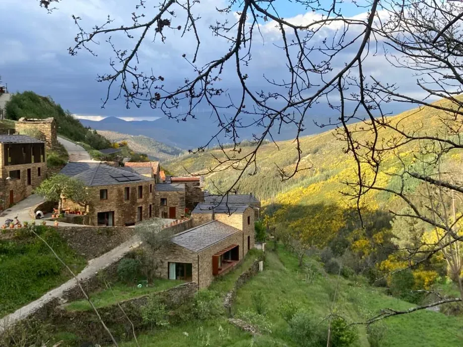 Pedro Goucha — set in central Portugal, Loural Ecovillage offers a rare blend of wild beauty and thoughtful design. A winding river meanders through the property, nurturing vegetable gardens, fruit trees, flowers, vines, and five beautiful natural cascades. Surrounded by 30 hectares of forested hills, it's more than just a location; it's a vibrant, living ecosystem.