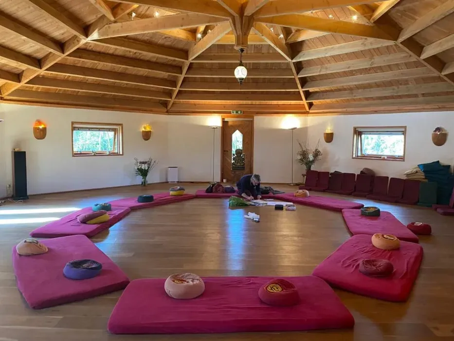 PHP Retreats — The center is situated in the peaceful rural countryside near Zwolle, Netherlands. It features a beautiful round wooden ceremony space set within a large garden, creating a serene and natural atmosphere conducive to deep introspection and connection.