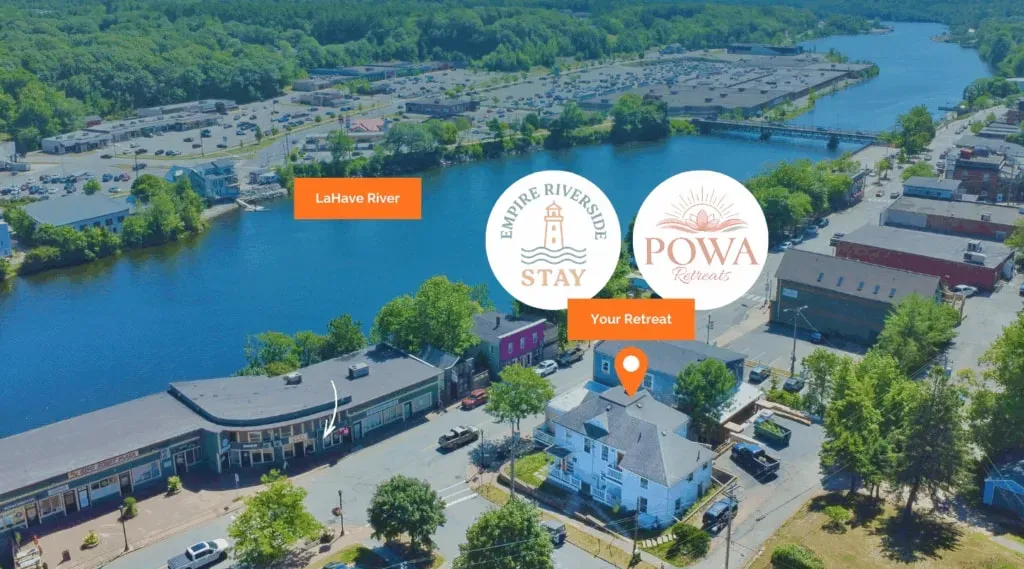 POWA Retreats — The Empire Riverside Stay, POWA Retreats' venue, is situated in downtown Bridgewater, Nova Scotia. It offers a comfortable, home-like environment with easy access to urban amenities like cafes and groceries, while also being close to natural elements such as trails and river walks for outdoor relaxation.