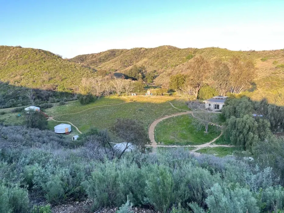 Pure Land Farms — The specific location of Pure Land Farms is not known, so details about the surrounding landscape and atmosphere are unavailable. However, the focus on traditional practices suggests a setting conducive to introspection and natural connection.