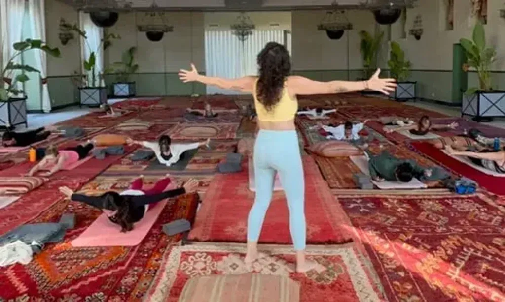 QARRYA RETREATS — Qarrya Retreats utilizes beautiful venues in and around Marrakech, offering a blend of natural tranquility and Moroccan charm. Imagine practicing yoga amidst the sounds of nature, in a lush jungle greenhouse, a majestic Kasbah, or by a serene pool. Some retreats even offer ocean views, providing a diverse and inspiring backdrop for your practice.