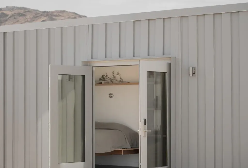 Reset Hotel Joshua Tree — set in the iconic Joshua Tree landscape, the hotel offers a serene and inspiring environment. The rugged desert terrain provides a dramatic backdrop, encouraging connection with nature and a sense of peaceful solitude, while the boutique design ensures comfort and modern amenities.