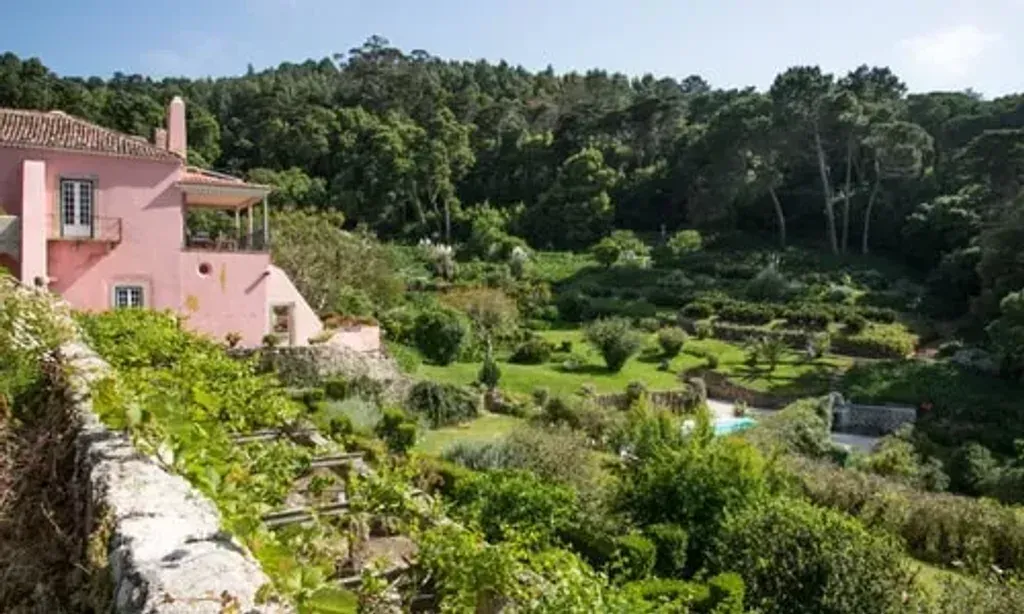 Retreat to Advance — Retreat to Advance finds its home in Sintra, Portugal, specifically at Quinta Sao Bento and Matalva. The venue offers a tranquil garden setting, with dinners served on a terrace providing views of the gardens and the distant sea. This creates a peaceful and inspiring backdrop for introspection and connection.