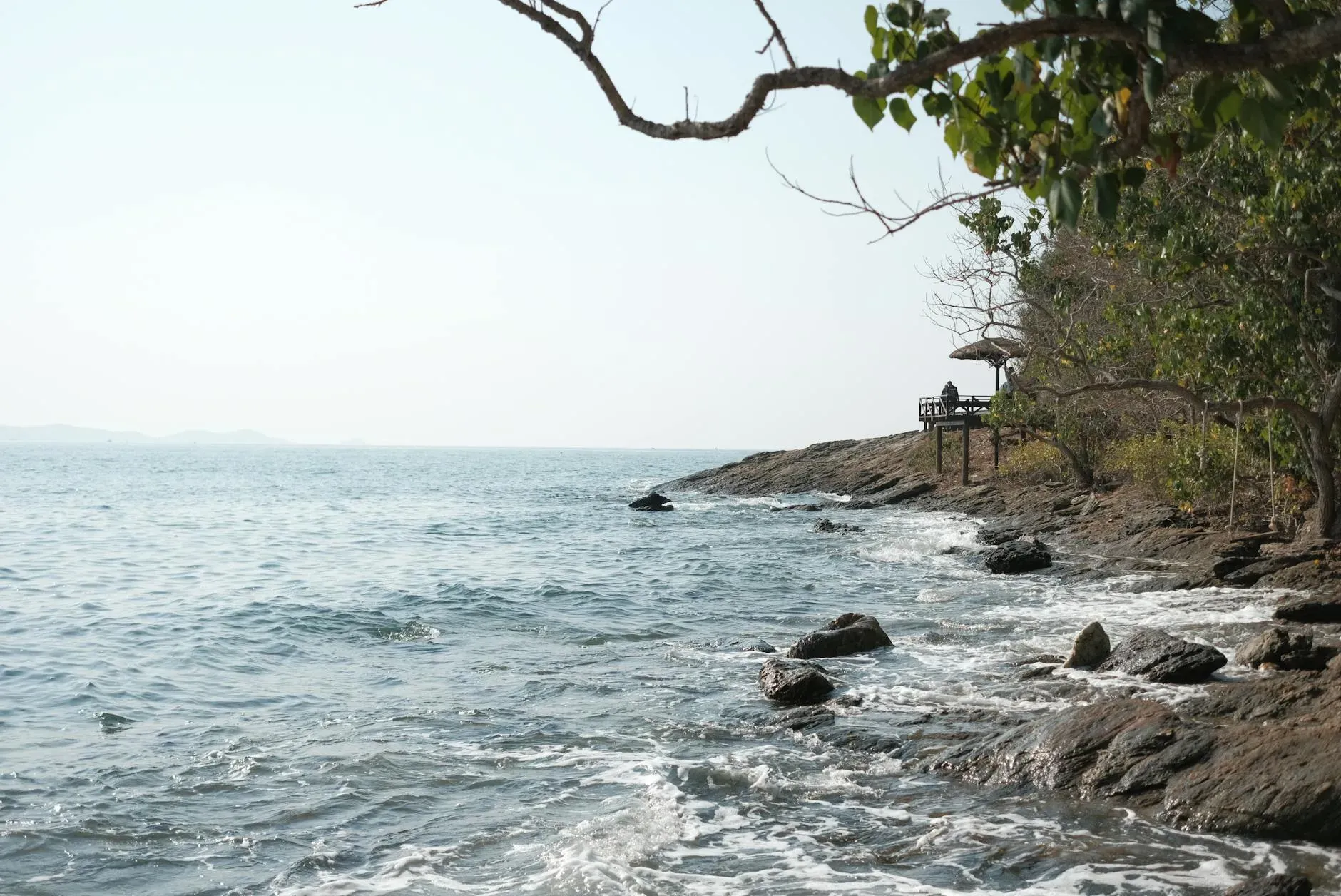 Roots Yoga Life — The training is held at a fortunate spot, secluded from tourist crowds on a rocky headland, placing you mere meters from the lush ocean. You can easily access snorkeling and canoeing, or simply relax by the private resort pool. White sandy beaches with restaurants and beachside massages are also nearby, offering a blend of tranquility and convenience.