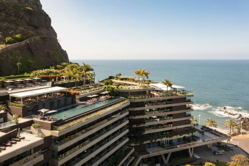 Saccharum Hotel — The center is set in the tranquil beauty of Arco da Calheta, offering sweeping views where the vast Atlantic Ocean meets the lush, verdant mountains of Madeira. This naturally serene environment is designed to invite deep rest and foster inner connection, providing a peaceful backdrop for all activities.