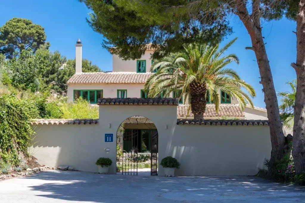 Sana Sana Retreat — The retreat is situated in the serene campo of Benissa, offering expansive countryside views. The private villa provides a peaceful atmosphere with a refreshing pool, shaded verandah, and comfortable indoor and outdoor spaces designed for relaxation and communal gathering.