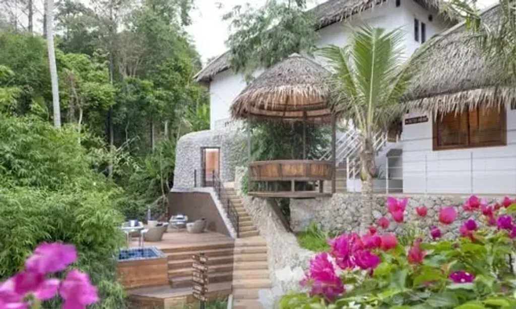 Santosa Detox & Wellness Centre — set in the lush hills of Kata, Phuket, the center boasts stunning views of the Andaman Sea. Its eco-inspired architecture, crafted from local stone, bamboo, and natural wood, blends seamlessly with the vibrant tropical gardens, creating a peaceful and harmonious atmosphere conducive to healing and relaxation.