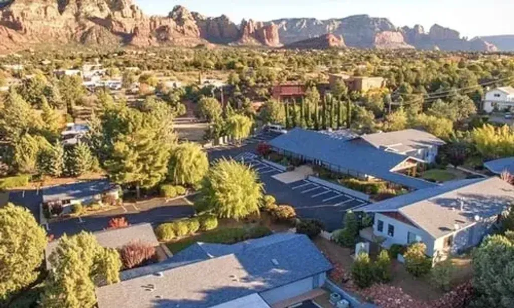 Sedonya Conscious Living Center — The center is situated in Sedona, Arizona, an area renowned for its striking red rock formations and perceived spiritual vortexes. The desert landscape provides a serene and inspiring environment, conducive to reflection and connection with nature. Expect clear skies, dramatic vistas, and a tranquil atmosphere that encourages a deeper sense of presence.