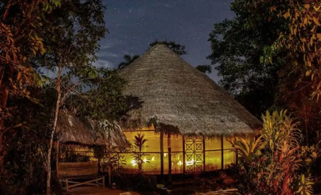 selfdiscoverytrips — The retreat unfolds in an amazing eco-lodge, situated directly on a riverbank within the protected Cordillera Escalera Conservation Area. This location offers private access to untouched river beaches and verdant jungle trails, immersing participants in a truly natural and energetic environment.