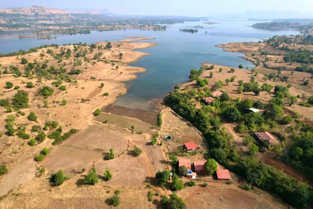 SiddhaDham Wellness Retreat — The center is beautifully situated on the tranquil edge of Vaitarna Lake, enveloped by pristine, untouched nature. This serene environment provides a perfect backdrop for introspection and relaxation, offering a peaceful escape from the hustle and bustle of daily life.