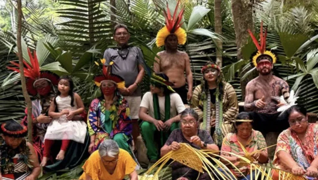 Sixth Sun Immersions — Deep within the Amazon rainforest, the Yawanawá Nova Esperança Village in Acre, Brazil, provides an unparalleled natural setting. Surrounded by lush biodiversity, the environment fosters a profound connection to nature and ancestral ways of life. The atmosphere is one of deep cultural immersion and ecological reverence.