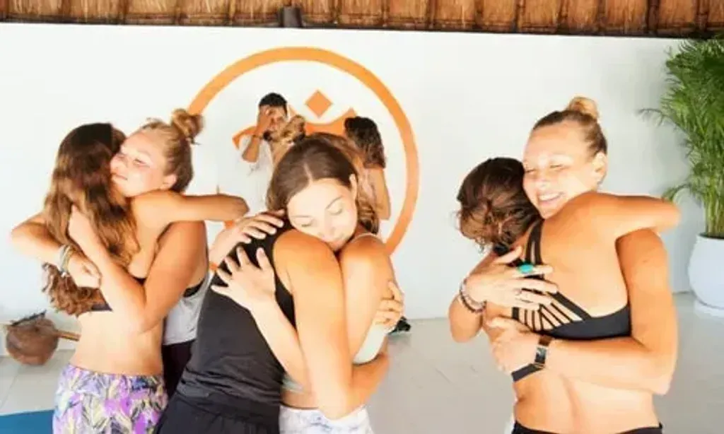 SOL Tuned — The retreat is set within an exclusive villa in Akumal's private Yal Ku Ha community, minutes from Akumal Pueblo and a short drive to Tulum. Guests enjoy complimentary access to the serene Yal Ku Lagoon for swimming and snorkeling, surrounded by architecture that blends luxury with natural elements like limestone and rich woods.