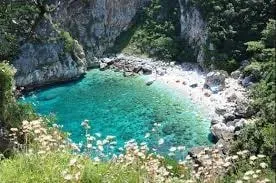 Spyridon — Argalastis offers a tranquil Mediterranean backdrop, with the sea and natural surroundings providing a calming atmosphere. The environment is designed to support introspection and relaxation, away from the hustle and bustle.