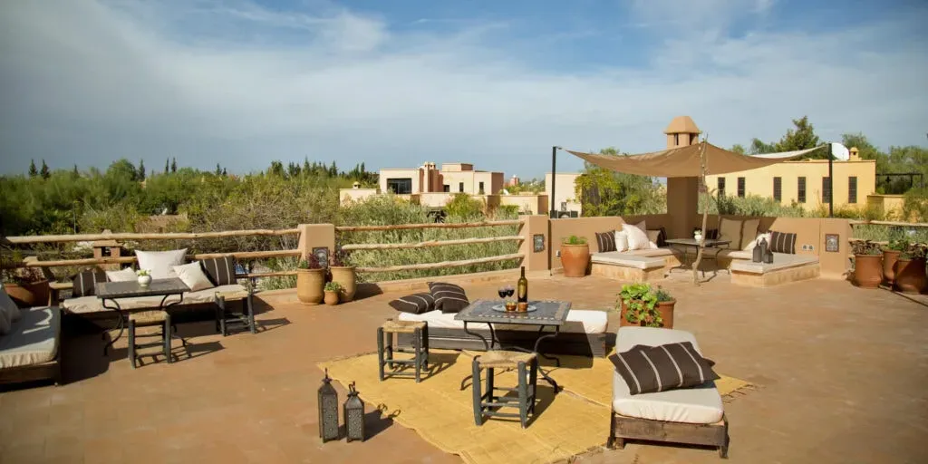 Strong Women — Fawakay Villas provides a serene backdrop for Strong Women retreats, featuring a lush complex of five sand-colored houses and three eco villa suites. These unobtrusively modern accommodations are set within three and a half acres of verdant garden, offering a peaceful and beautiful environment just outside Marrakech.