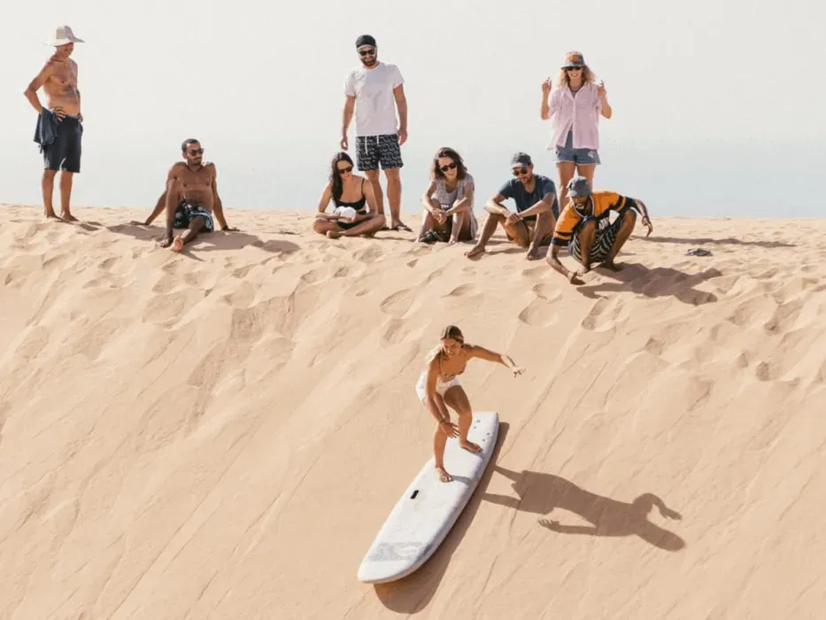 Tamraght Surf House & Yoga — The center is situated in Tamraght, a peaceful coastal village overlooking the Atlantic Ocean. It's set between the bustling city of Agadir and the popular surf destination of Taghazout. The area is characterized by its chilled vibe, friendly locals, and golden sunsets, with sweeping views of surf spots like Banana Point.