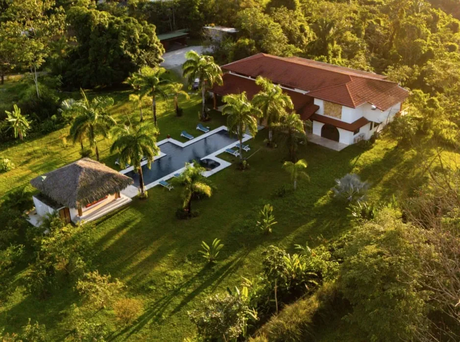 The ARK — The ARK is situated in Santa Teresa, Costa Rica, with its retreat venue, Villa Tanit, perched on a lush hilltop. This location provides sweeping views of the Pacific Ocean and the surrounding jungle, creating a serene and inspiring atmosphere. The village itself promotes unity and regeneration, blending modern amenities with natural beauty.