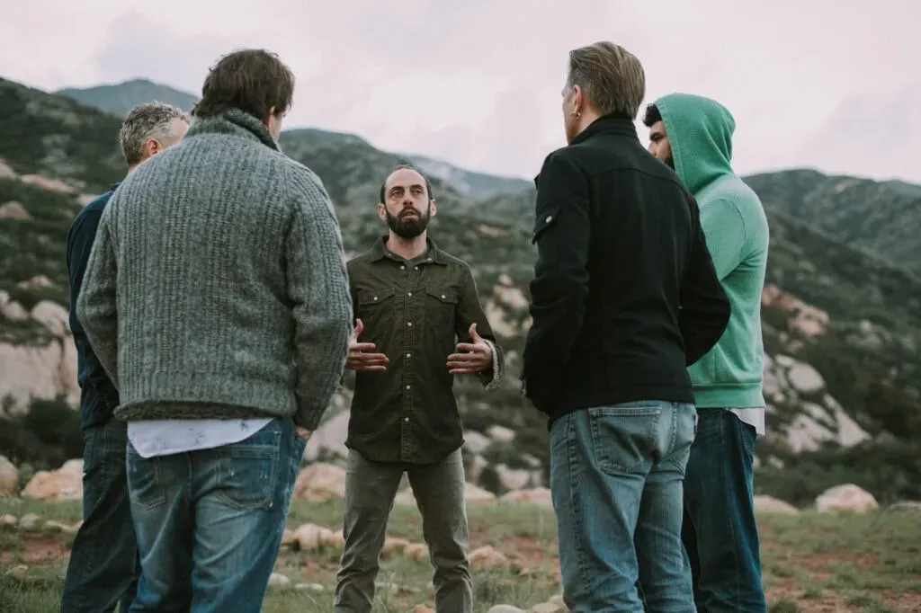 The Essential Man — The specific setting for each retreat varies, as The Essential Man curates experiences at different venues. However, the focus remains on creating an environment conducive to deep personal work and authentic connection.