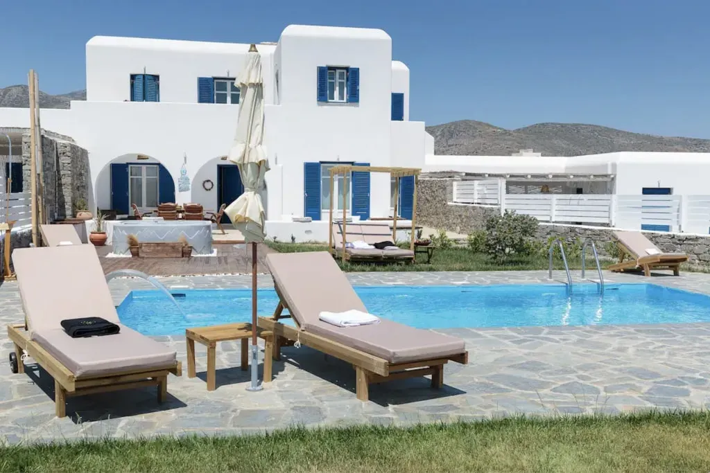 The Feminine Ethos Retreats — The retreat unfolds on the picturesque Greek island of Paros, renowned for its crystal-clear blue waters and peaceful atmosphere. The venue comprises two charming villas, offering a shared pool and common areas that invite relaxation and connection amidst the island's natural beauty.