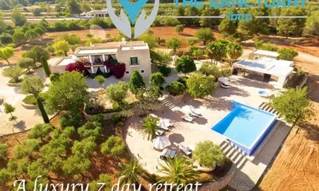 The Sanctuary Ibiza — Perched in the pine-strewn hills of Ibiza, The Sanctuary offers breathtaking views to the east, overlooking Santa Eulalia and the sparkling sea. The luxury 5-star villa provides a serene and opulent backdrop for healing and rejuvenation, blending the island's natural beauty with sophisticated comfort.
