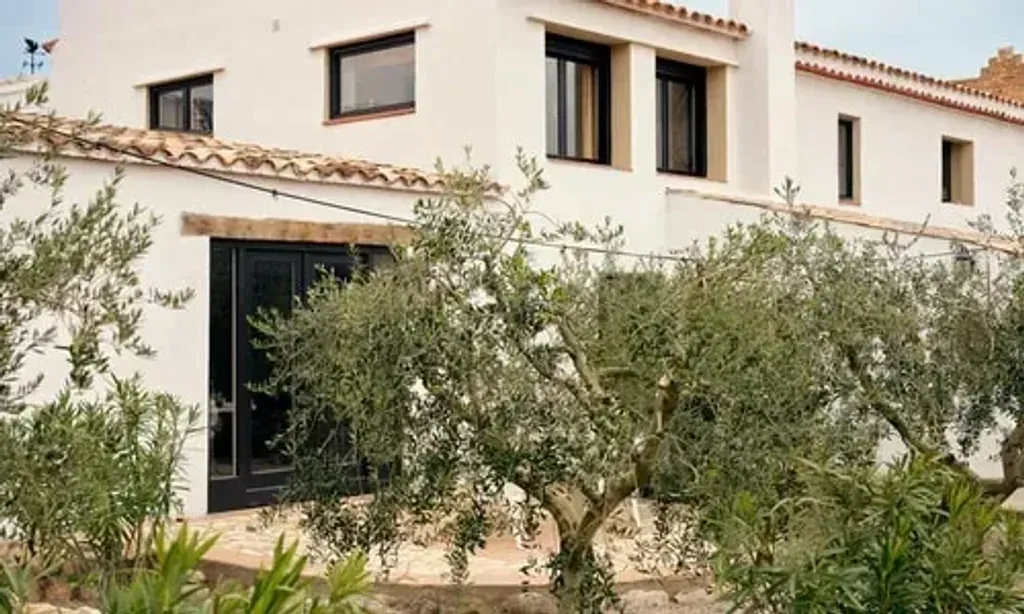 The Soul Farm — The Soul Farm is situated in a natural environment, an ancient farm amidst the picturesque vineyards of Catalonia. It offers a serene and inspiring backdrop for personal development, blending rustic charm with thoughtful design.