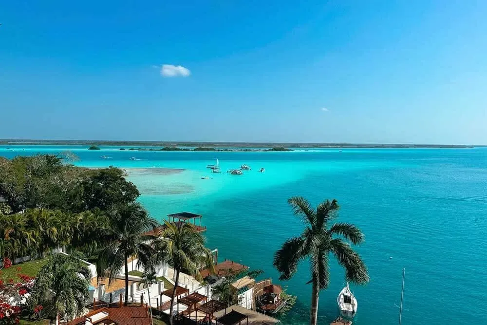 The Soulful Solo — The Soulful Solo is situated in Bacalar, Mexico, a small eco-conscious town on the Caribbean coast. Known as the Lagoon of Seven Colors, Bacalar boasts freshwater that transitions from turquoise to emerald and deep blue, creating a serene and inspiring atmosphere. The retreat itself is a private home, offering a real, lived-in experience within this tropical setting.