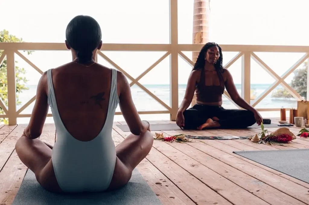 The Venus Voyage — The retreat is situated within the vibrant Jamaican rainforest, offering a lush, natural environment. The villa itself provides a cozy and stylistic atmosphere, acting as a sanctuary for creatives. Guests can enjoy stunning ocean views from the outdoor pool and direct access to a private beach.