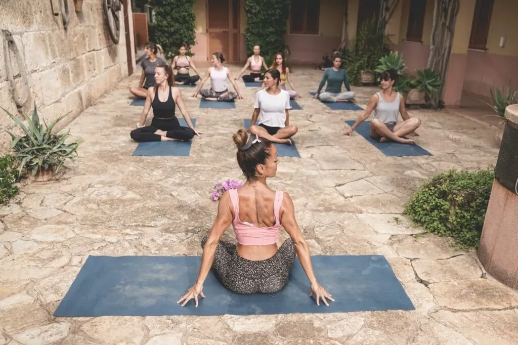 The Yoga Concept — The Bamboo Chai, a magical retreat venue, is set in the tranquil Mallorcan countryside. It offers a serene escape where nature's beauty surrounds you, providing a perfect blend of traditional charm and peaceful seclusion. Despite its quiet setting, it's conveniently located near Porto Cristo town and the beautiful beaches of Mallorca's east coast.