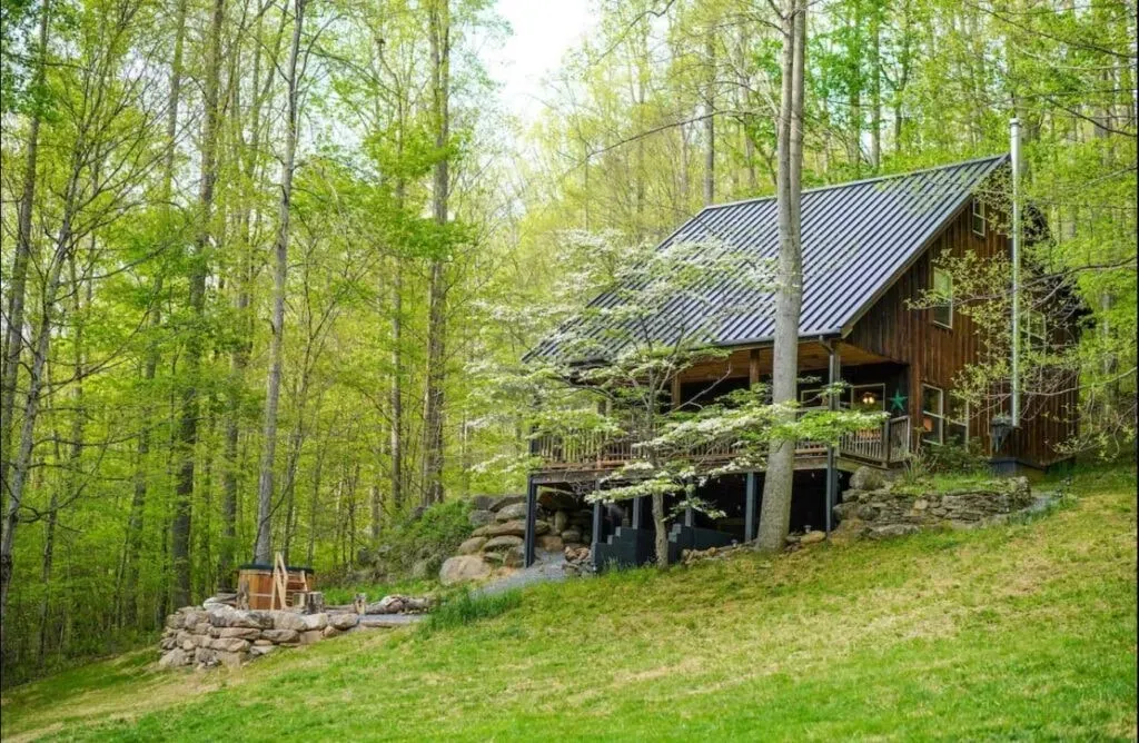 Tiffany Marshall — The retreat is housed within a beautifully renovated cabin, designed with individual wellness and sustainability at its core. Surrounded by the natural tranquility of Burnsville, the setting encourages relaxation and introspection, offering a peaceful escape from daily demands.