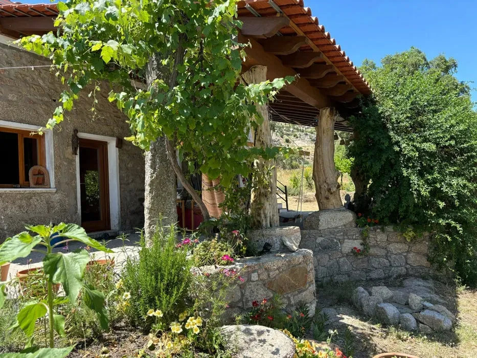 Transformative Connection Retreats — The retreat center is situated in an area of exceptional natural beauty in Monsanto, Portugal. The land retains an archaic wildness, characterized by cork oaks, olive and orange trees, and impressive granite boulders. This natural environment provides a tranquil and inspiring backdrop for reflection and connection.