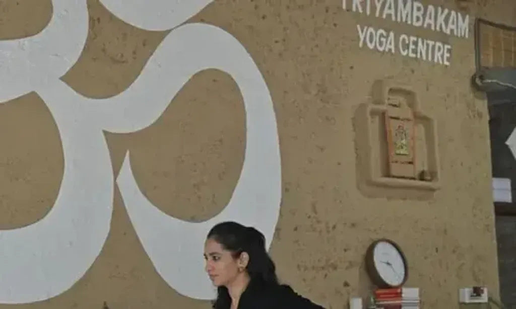 Triambakam Yoga Centre — Located in Narendra Nagar, Rishikesh, the center is situated near the Bloom Room Hotel, offering a blend of accessibility and a serene atmosphere. Rishikesh itself is set in the foothills of the Himalayas, providing a naturally inspiring backdrop for spiritual practice, with the Ganges River flowing nearby.