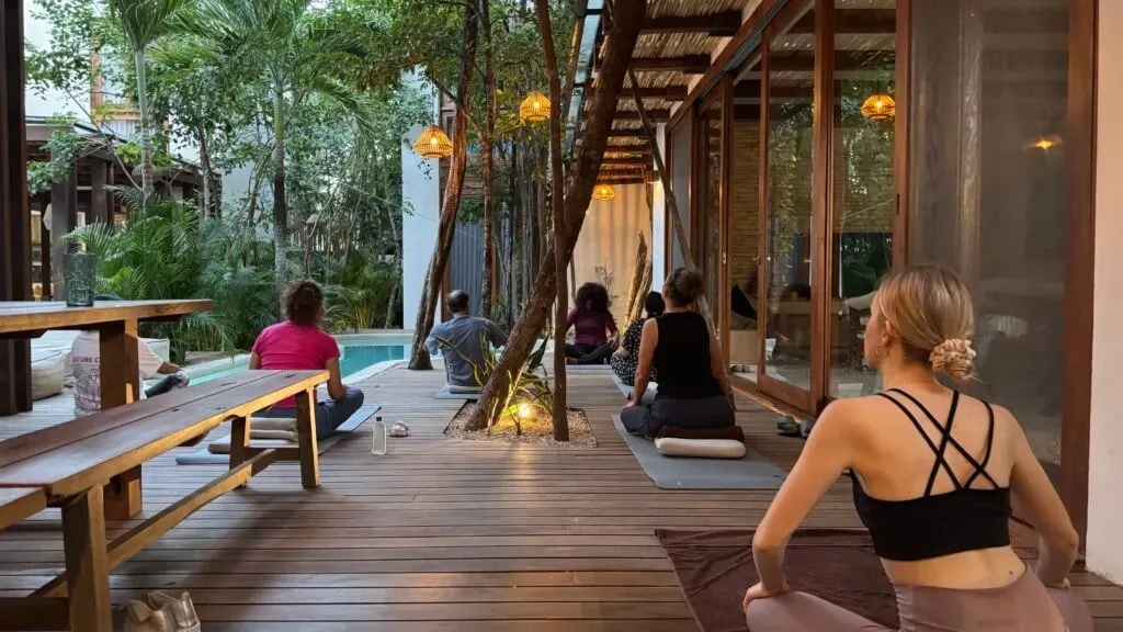 VANDE WELLNESS — The center is situated in a beautiful villa, enveloped by the lush jungle of Tulum. This natural environment provides a tranquil and private atmosphere, ideal for introspection and relaxation. Guests can enjoy the tropical surroundings from various comfortable spaces within the villa, including poolside areas and a rooftop with a warm tub.