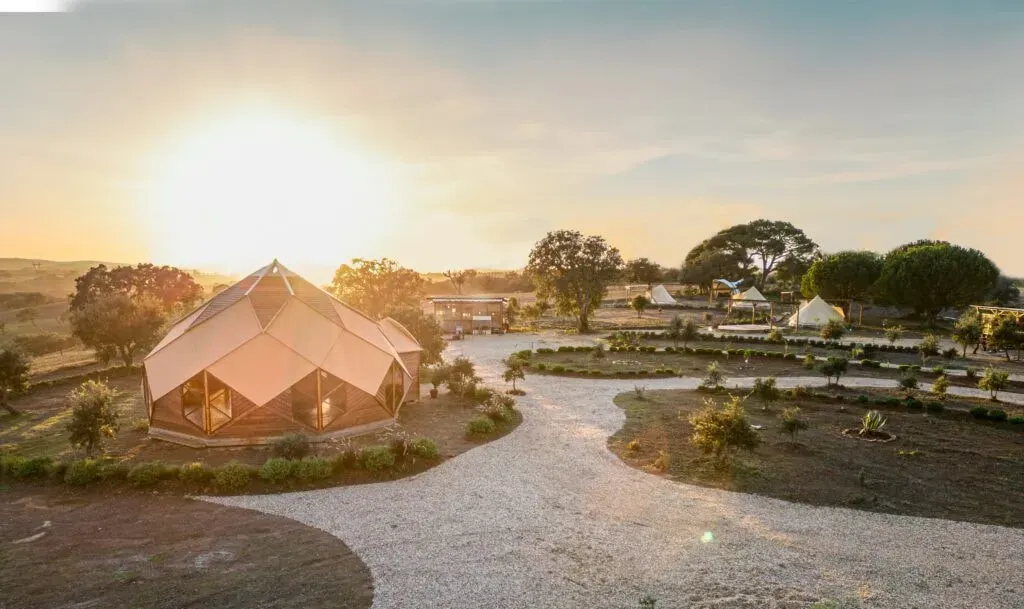 Voice Magnet Retreat — The retreat is located amidst the stunning natural beauty of the Alentejo region in Portugal. It operates completely off-grid, drawing its electricity and water from natural resources, creating an immersive and sustainable environment.