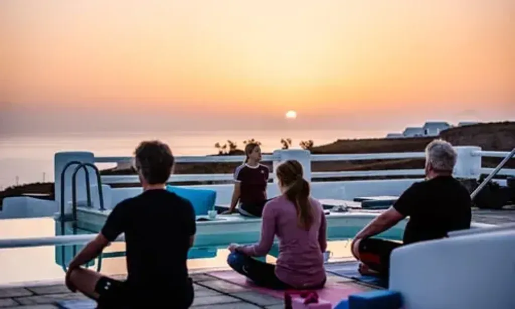 Wellbeing with Gemma — Situated amidst the beautiful Santorini countryside, the retreat boasts a sprawling 6000-square-meter property that offers expansive views of the Aegean Sea. This idyllic location provides a profound sense of spaciousness, privacy, and comfort, creating a tranquil backdrop for your wellness journey. The proximity to Vourvoulos beach and the charming Fira Town adds to the allure, blending natural beauty with convenient access to local culture.
