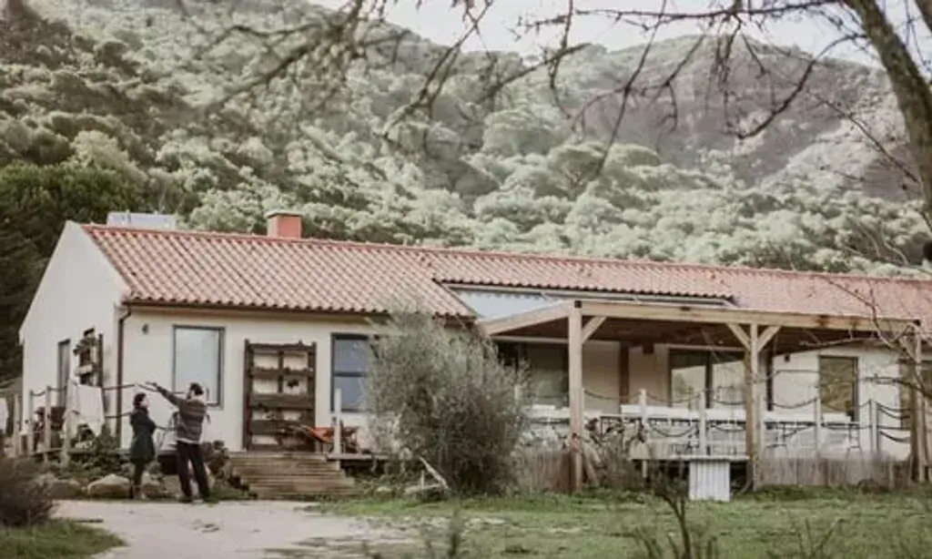 Women’s empowerment retreat — The retreat unfolds in the breathtaking Serra da Arrabida, a protected heritage site in Setúbal, Portugal. This location is celebrated for its healing energy, where the rugged beauty of the mountains meets the tranquil turquoise waters of the ocean. Wild vegetation embraces the grounds, creating a peaceful and grounding atmosphere that encourages deep connection with nature.