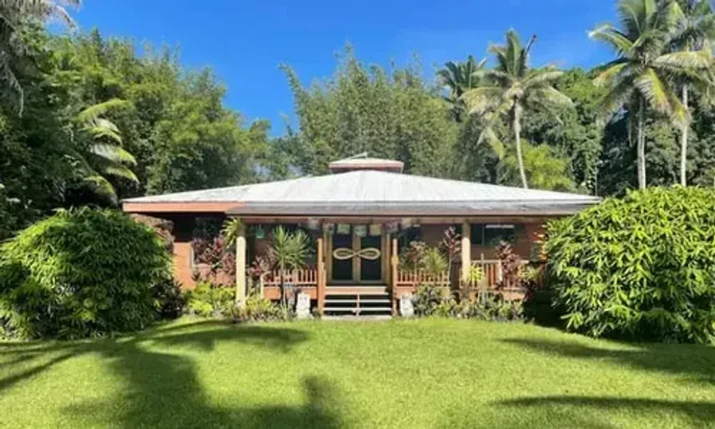 Yemaya Indira - The Embrace — The center is located on Papaya Farms Road in Pahoa, Hawaii. While specific details about the immediate surroundings are not provided, the area is known for its lush, tropical environment, offering a serene backdrop for healing and introspection. Visitors can anticipate a natural setting conducive to deep personal work.