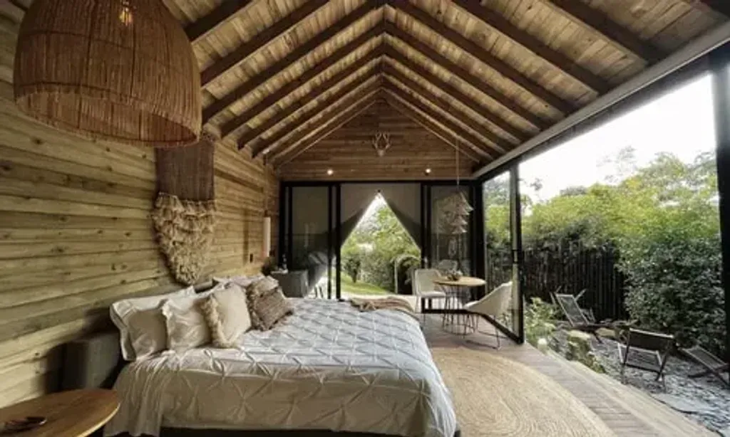 YinYang Wellness Retreats — The retreat accommodation is set within a stunning paradise, surrounded by tropical landscapes and gently rolling lush green hills. The mild weather complements the serene environment, inviting guests to unplug and unwind in Colombia's tranquil countryside, fostering a relaxed and chilled-out vibe.