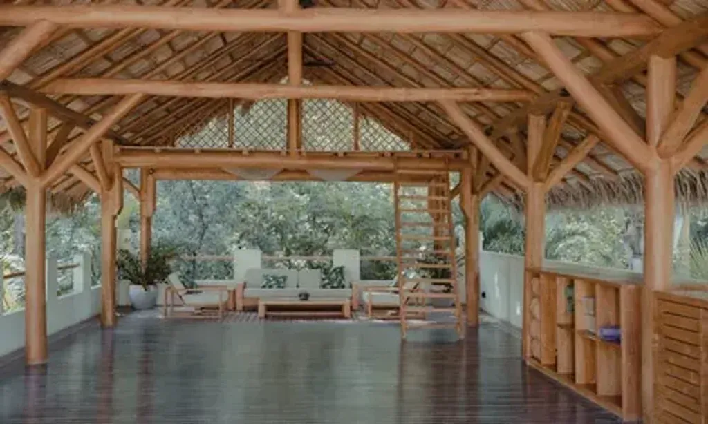 Yoga By Rony — set amidst the lush Costa Rican jungle, Yoga By Rony provides a serene and vibrant atmosphere. The resort is just a short stroll from the lively beach town of Nosara, offering a perfect balance of natural immersion and local culture. The open-air yoga shala allows for practice surrounded by the sounds and sights of nature, enhancing the sense of peace and connection.