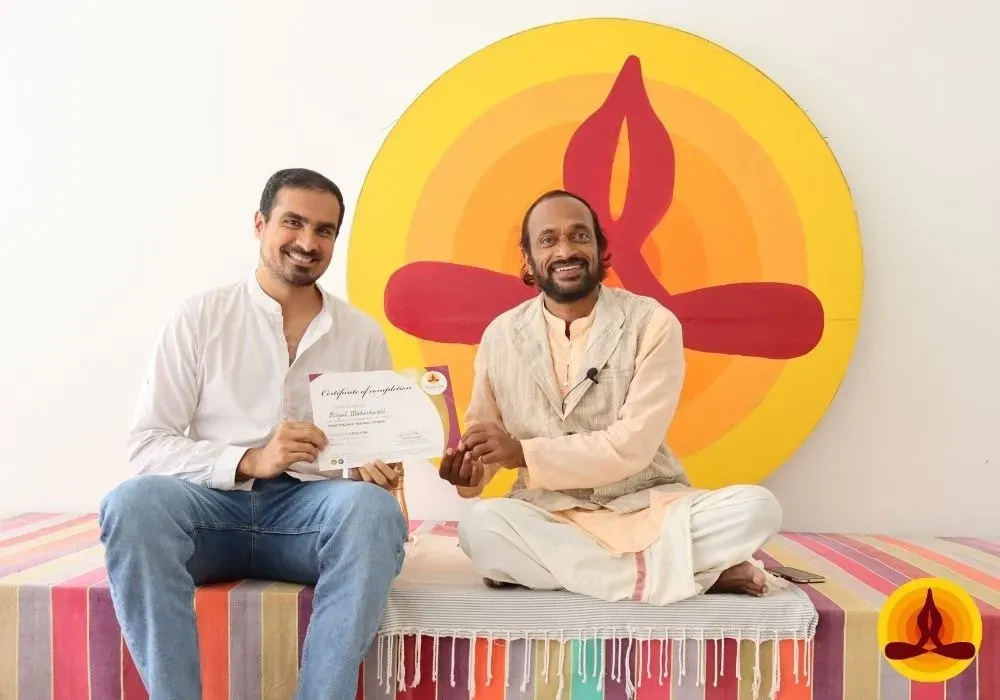 Yoga Gita, The Science of Consciousness — The ashram is situated amidst agricultural fields near the historical town of Srirangapatna, just outside Mysore. It borders the tranquil Kaveri River, where the sounds of nature, from crickets to various birds, create a peaceful and inspiring atmosphere day and night. It's a place designed to celebrate life in harmony with the natural world.