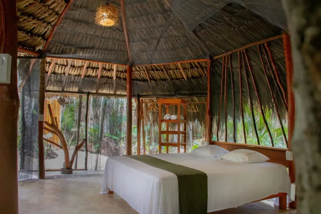 YURA TULUM — Yura Tulum is situated within the lush jungle landscape of Tulum, providing a tranquil and natural environment for retreat participants. Despite its secluded feel, it's conveniently located just a short drive from local amenities, offering both peace and accessibility. The atmosphere encourages deep connection with nature and self.