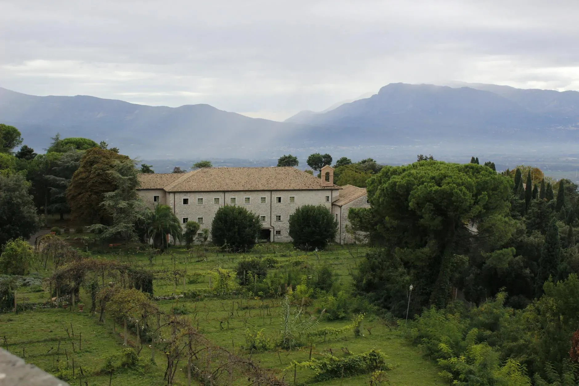 Santacittarama — Santacittarama is situated in the rolling Sabina hills of Rieti province, an area renowned for its olive groves and vineyards. The monastery spans 11 hectares, encompassing a mix of woodland and open meadows, providing a naturally beautiful and tranquil environment for contemplation. Its location, just 35 miles north of Rome, offers both seclusion and accessibility to Italy's capital.