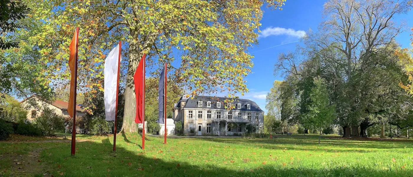 Dechen Chöling — The center is situated in the serene French countryside, offering a peaceful and beautiful natural environment conducive to meditation and introspection. The landscape provides a quiet backdrop, allowing guests to fully immerse themselves in their practice away from urban distractions.