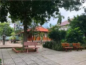 Dhamma Vutthi — The center is located in Củ Chi, an area known for its historical significance and rural landscapes outside the bustling Ho Chi Minh City. While specific details on the immediate surroundings are not provided, the address suggests a quieter, more removed environment conducive to focused meditation practice, away from urban distractions.